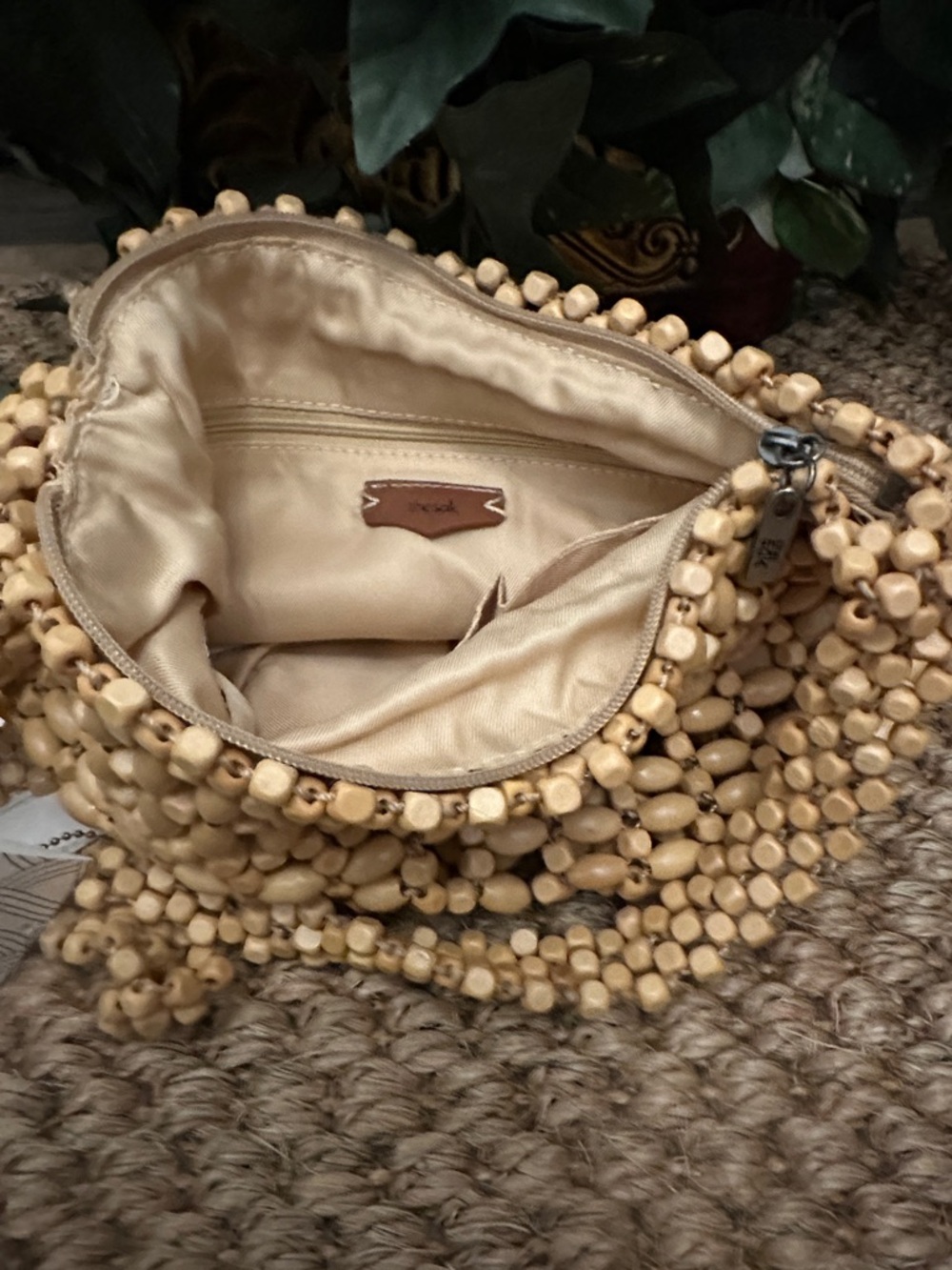 The Sak Beaded Straw Wristlet in Natural Beige